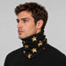 Goldbergh unisex Anzu Neck Gaiter in Black/Gold (Black/Gold) - mens side. AI-generated from manufacturer imagery.