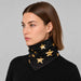 Goldbergh unisex Anzu Neck Gaiter in Black/Gold (Black/Gold) - womens side. AI-generated from manufacturer imagery.