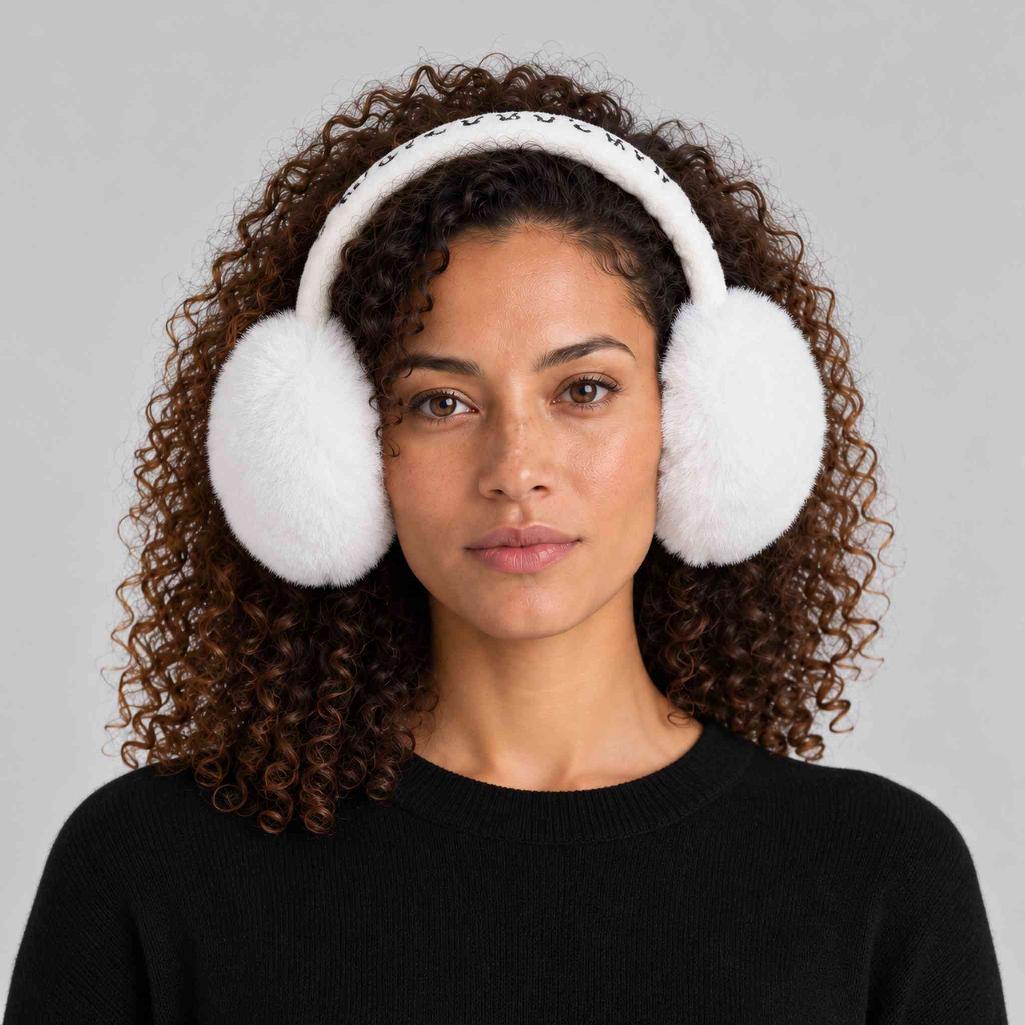Goldbergh unisex Fluffy Earwarmers in White (Snow White) - womens front. AI-generated from manufacturer imagery.