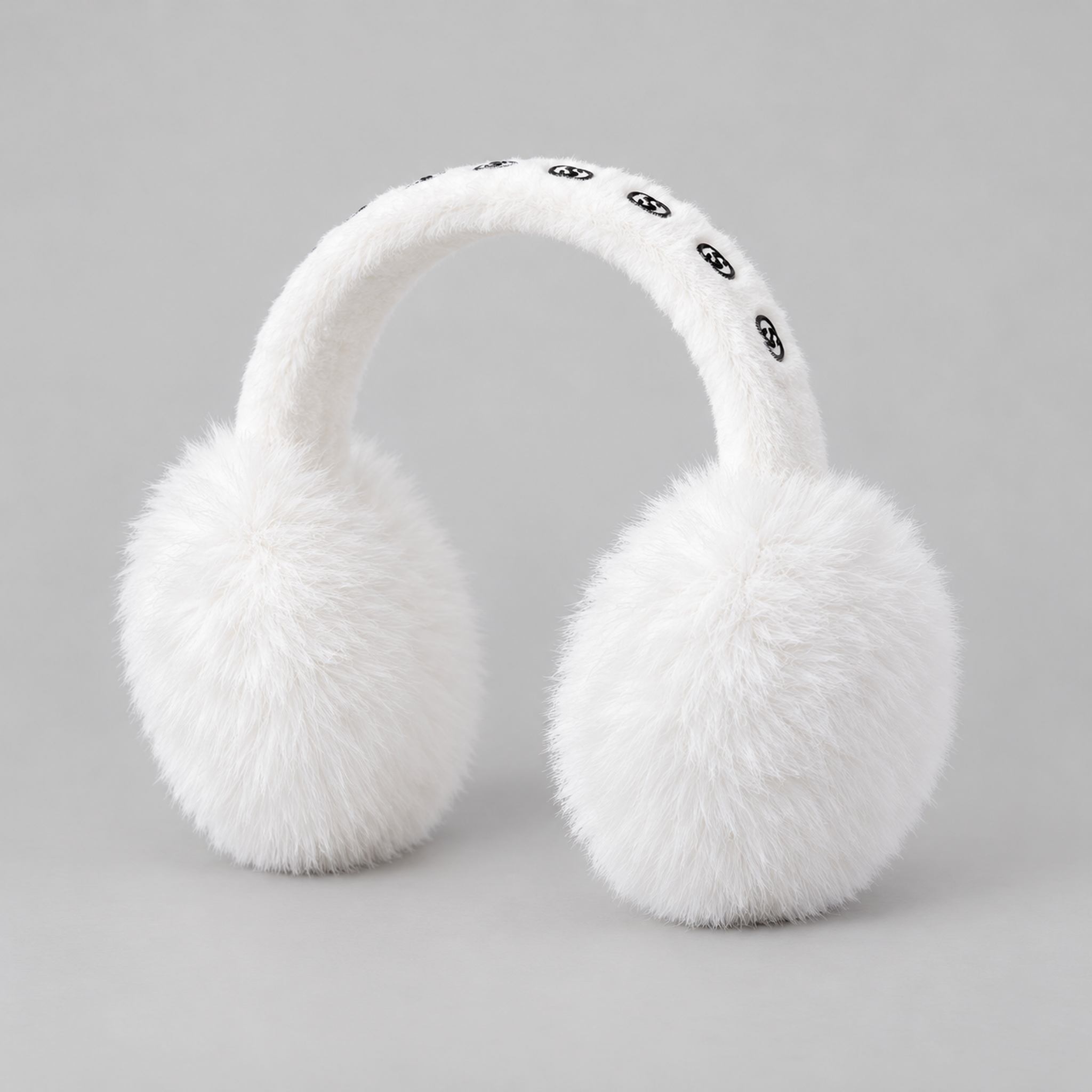 Goldbergh unisex Fluffy Earwarmers in White (Snow White) - side. AI-generated from manufacturer imagery.