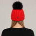 Goldbergh Hodd Beanie in Flame Red in Flame — womens back. AI-generated from manufacturer reference photographs.