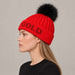 Goldbergh Hodd Beanie in Flame Red in Flame — womens side. AI-generated from manufacturer reference photographs.