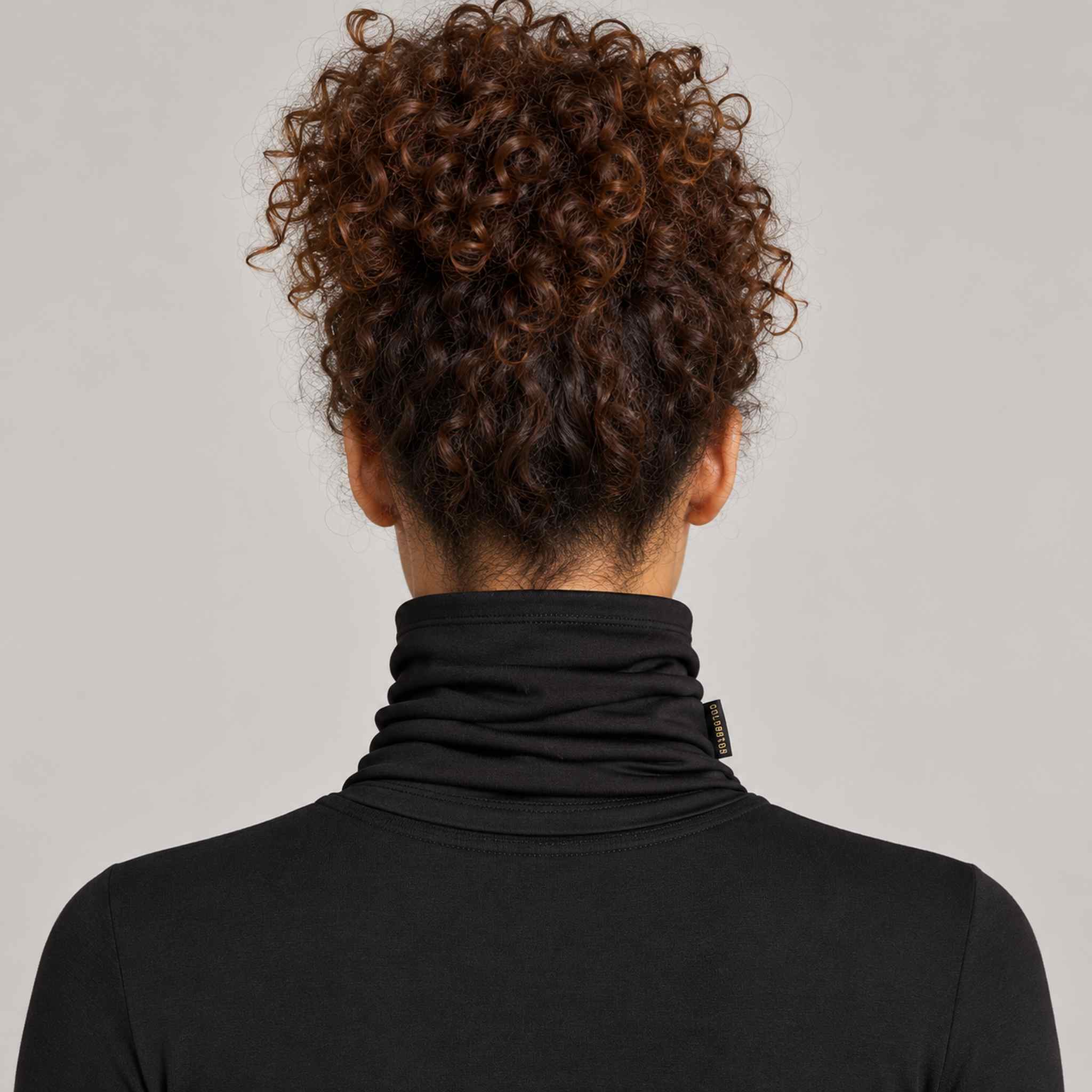 Goldbergh Kira Neck Gaiter in Black — womens back. AI-generated from manufacturer reference photographs.