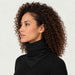 Goldbergh unisex Kira Neck Gaiter (Black) - womens side. AI-generated from manufacturer imagery.
