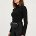 Goldbergh unisex Nara Bum Bag (Black) - womens side. AI-generated from manufacturer imagery.