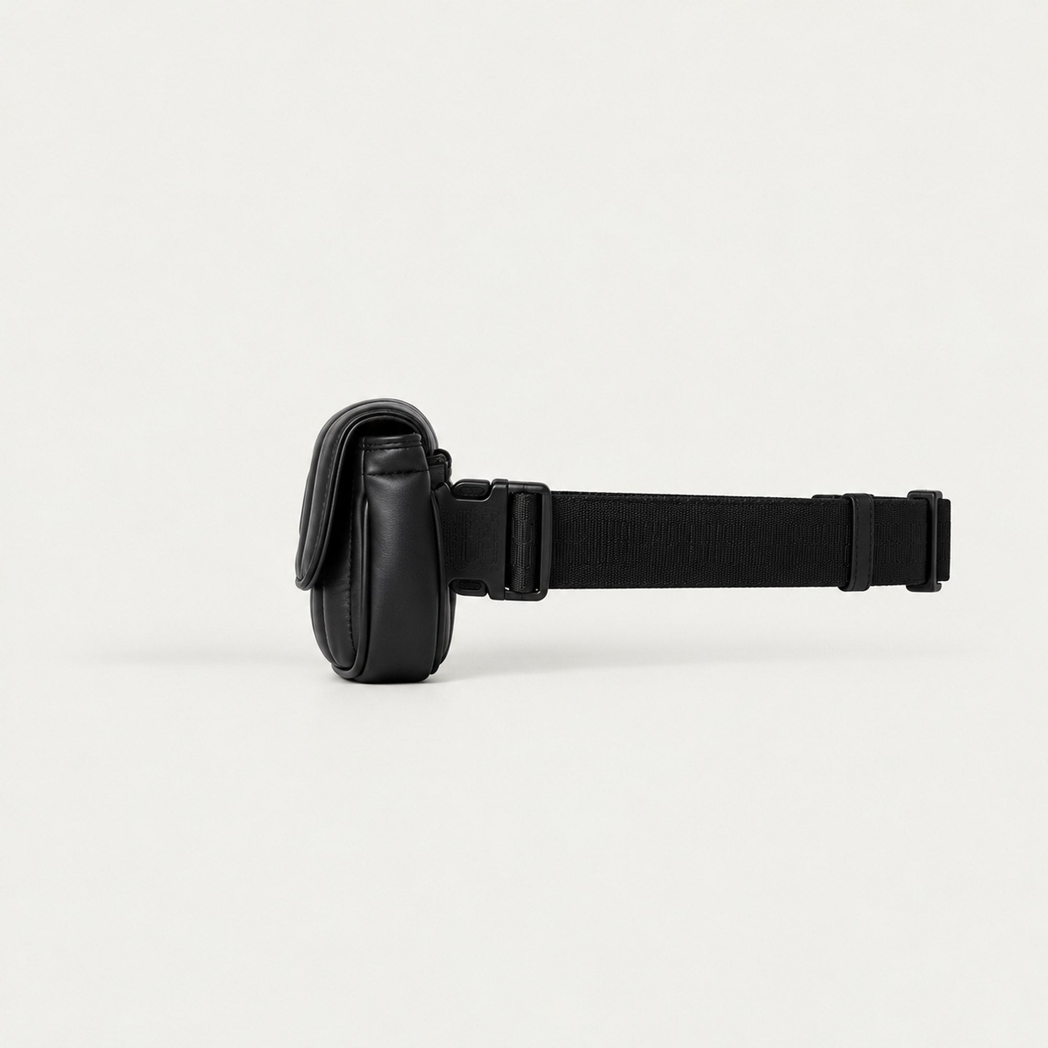 Goldbergh unisex Nara Bum Bag (Black) - side. AI-generated from manufacturer imagery.