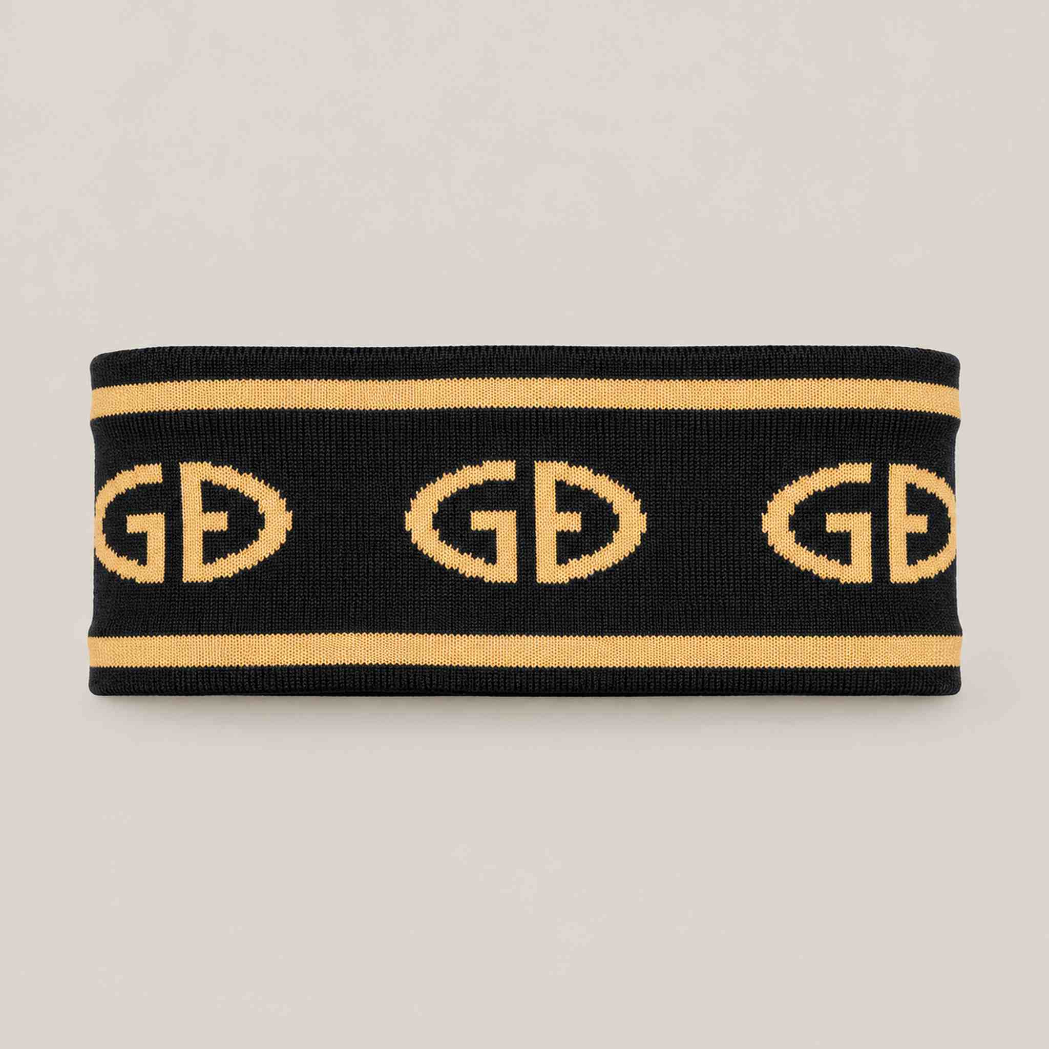Goldbergh Tiara Headband in Black/Gold in Black Gold — front. AI-generated from manufacturer reference photographs.