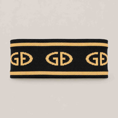 Goldbergh Tiara Headband in Black/Gold in Black Gold — front. AI-generated from manufacturer reference photographs.