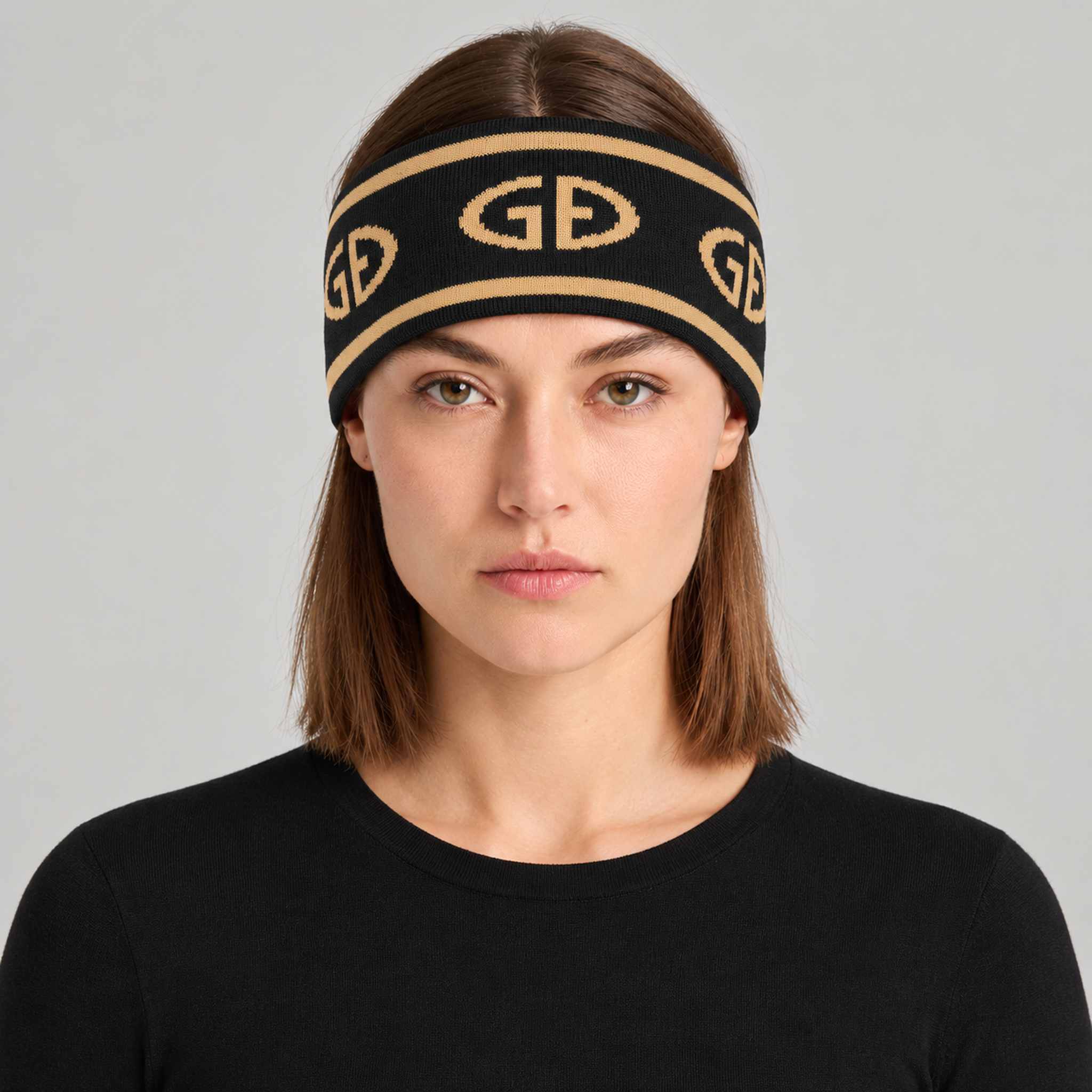 Goldbergh Tiara Headband in Black/Gold in Black Gold — womens front. AI-generated from manufacturer reference photographs.
