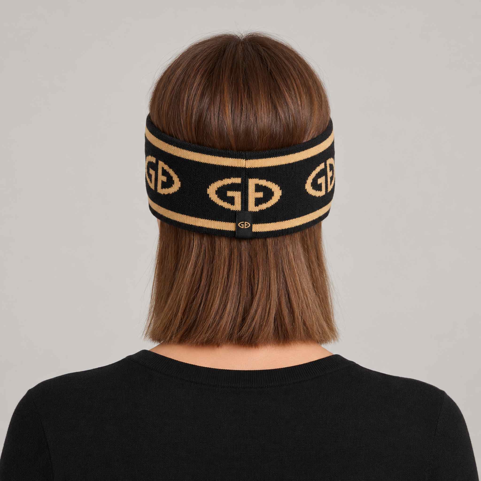 Goldbergh Tiara Headband in Black/Gold in Black Gold — womens back. AI-generated from manufacturer reference photographs.