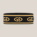 Goldbergh Tiara Headband in Black/Gold in Black Gold — side. AI-generated from manufacturer reference photographs.