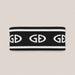 Goldbergh Tiara Headband in Black in Black White — front. AI-generated from manufacturer reference photographs.