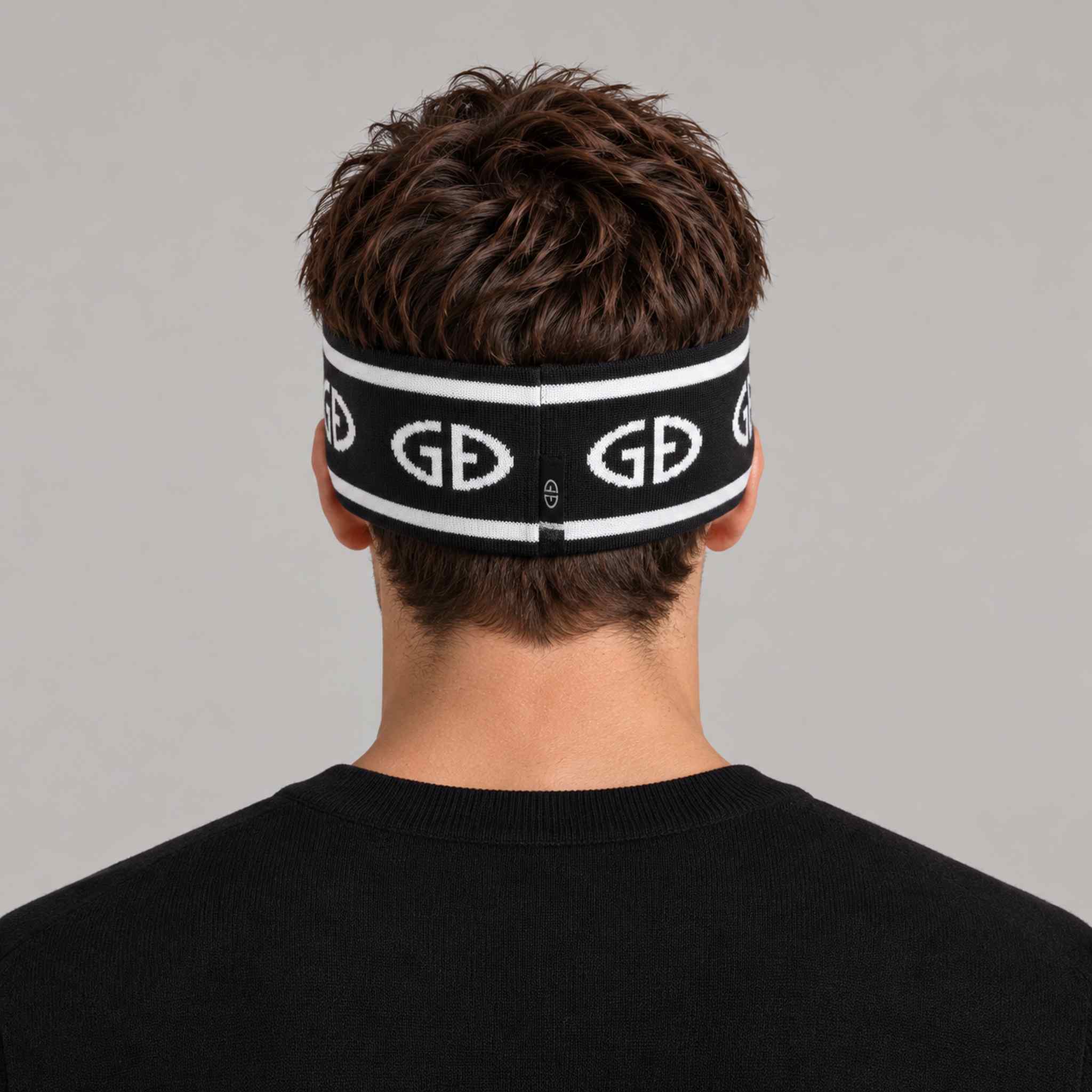 Goldbergh Tiara Headband in Black in Black White — mens back. AI-generated from manufacturer reference photographs.