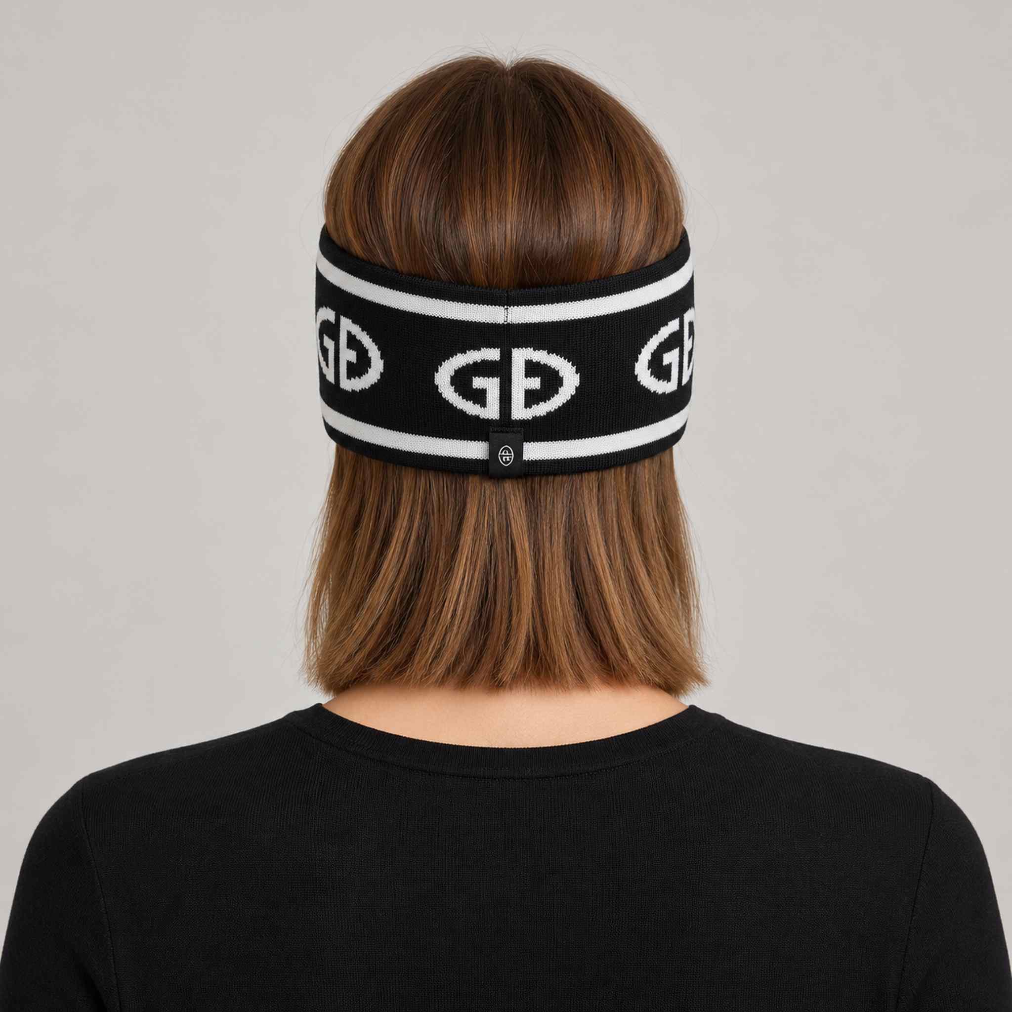 Goldbergh Tiara Headband in Black in Black White — womens back. AI-generated from manufacturer reference photographs.