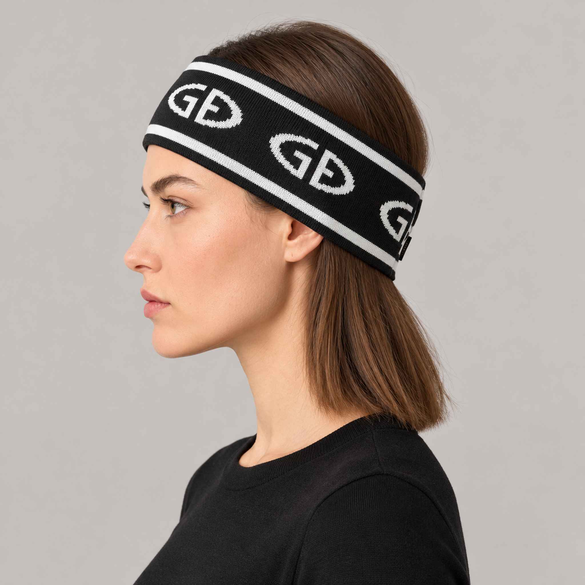 Goldbergh Tiara Headband in Black in Black White — womens side. AI-generated from manufacturer reference photographs.