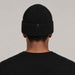 Goldbergh Valerie Beanie in Black in Black — mens back. AI-generated from manufacturer reference photographs.