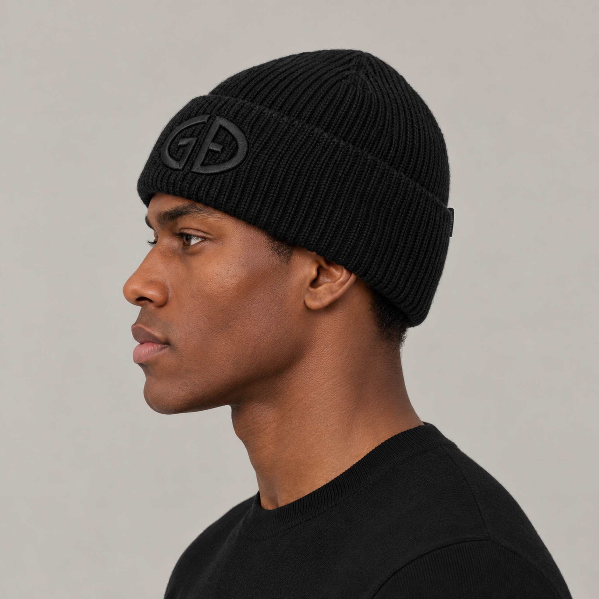 Goldbergh Valerie Beanie in Black in Black — mens side. AI-generated from manufacturer reference photographs.