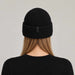 Goldbergh Valerie Beanie in Black in Black — womens back. AI-generated from manufacturer reference photographs.