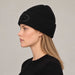 Goldbergh Valerie Beanie in Black in Black — womens side. AI-generated from manufacturer reference photographs.