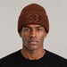 Goldbergh Valerie Beanie in Deep Mocha in Deep Mocha — mens front. AI-generated from manufacturer reference photographs.