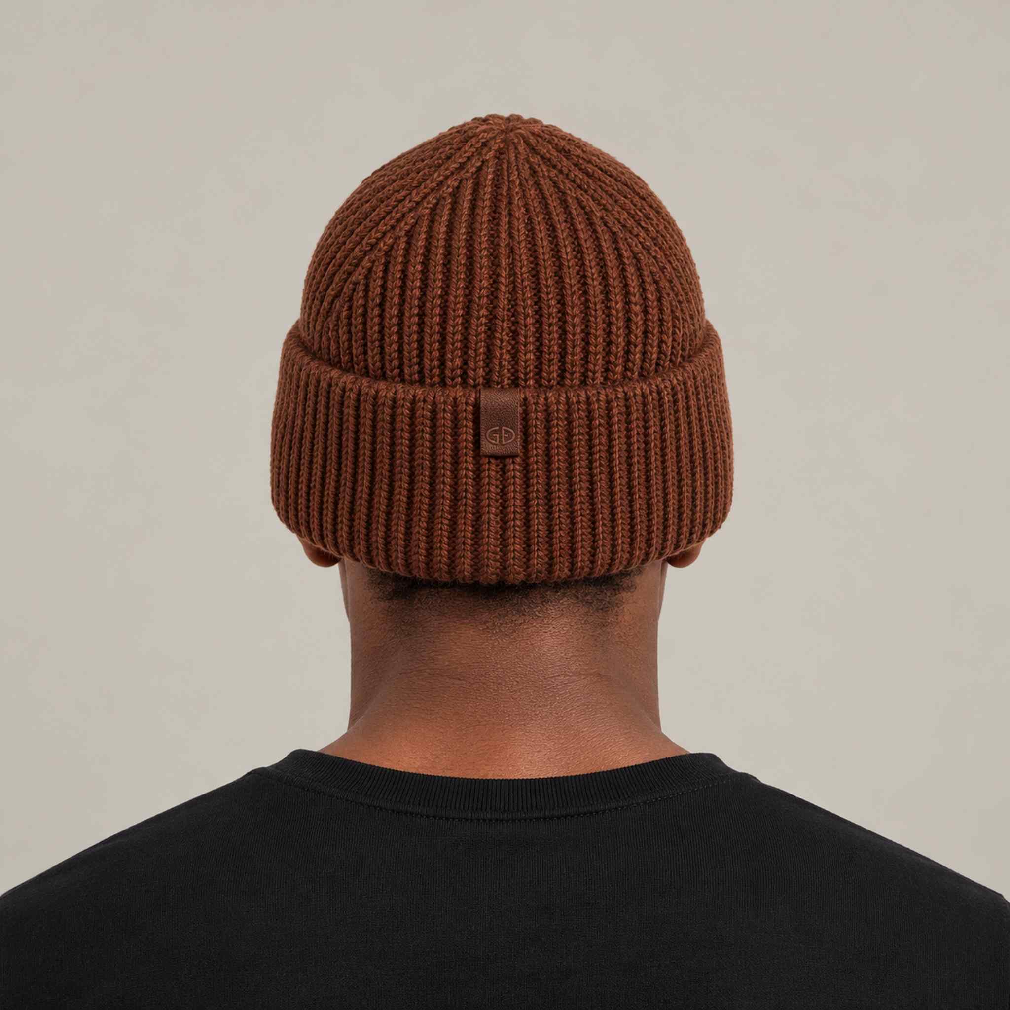 Goldbergh Valerie Beanie in Deep Mocha in Deep Mocha — mens back. AI-generated from manufacturer reference photographs.