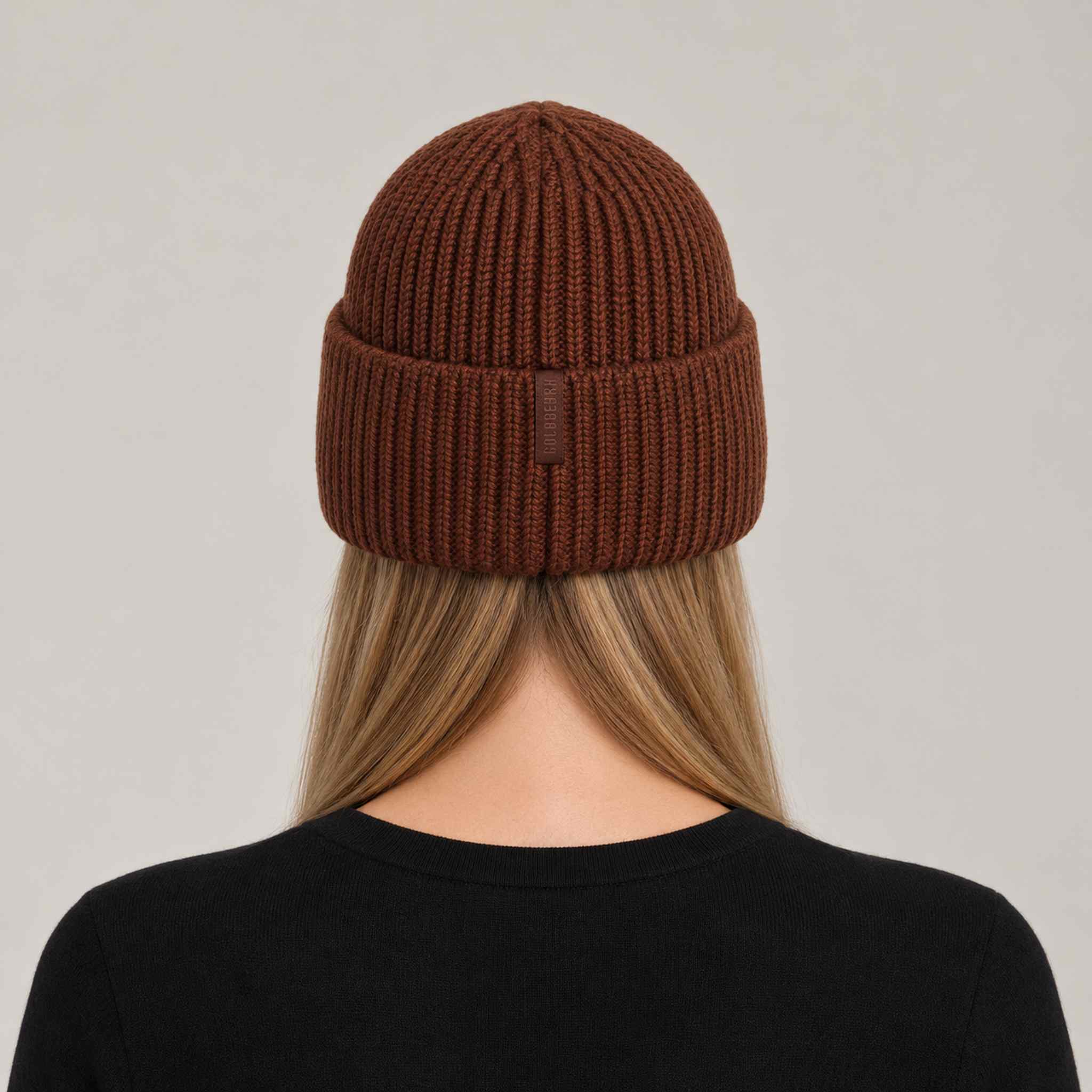 Goldbergh Valerie Beanie in Deep Mocha in Deep Mocha — womens back. AI-generated from manufacturer reference photographs.