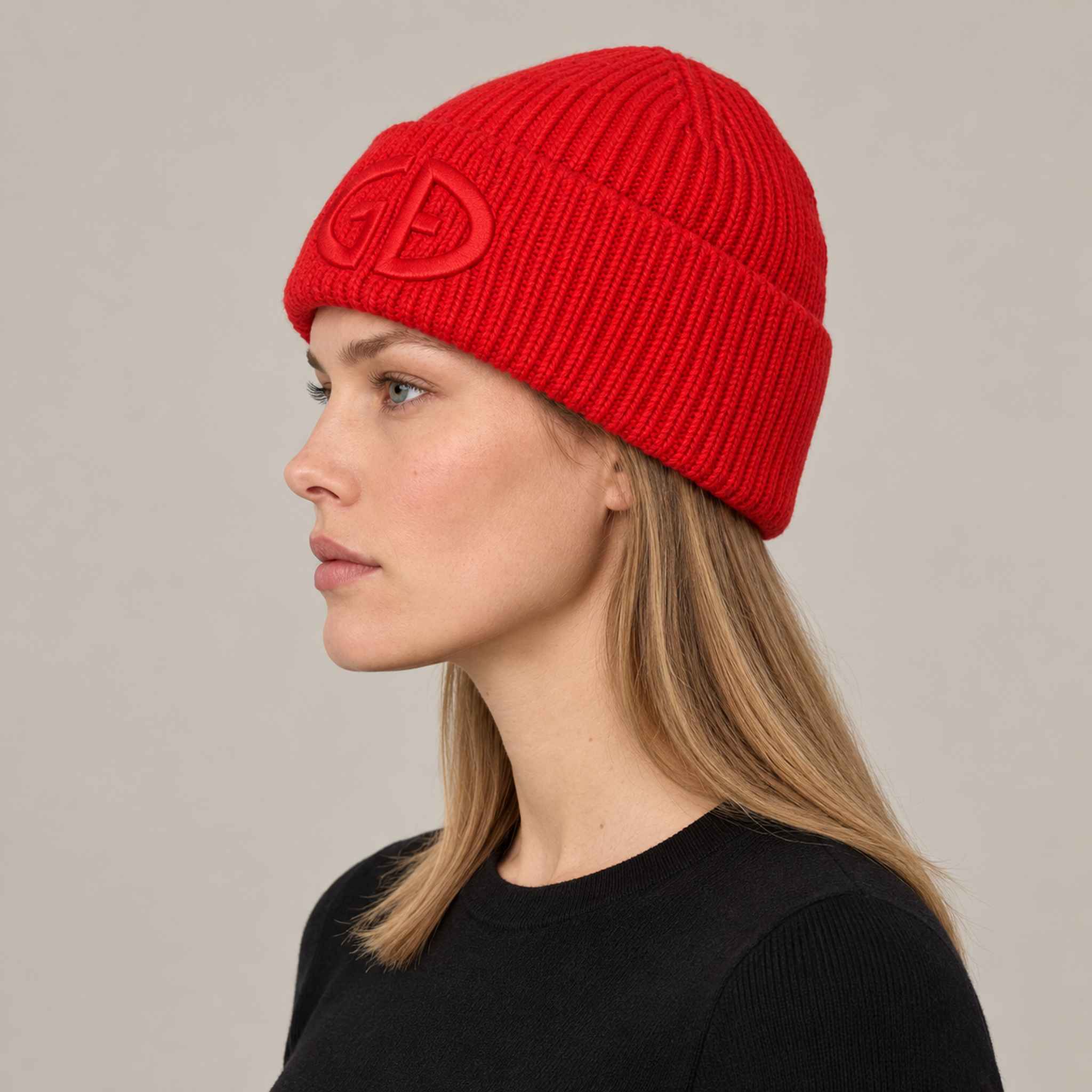 Goldbergh Valerie Beanie in Flame in Flame — womens side. AI-generated from manufacturer reference photographs.