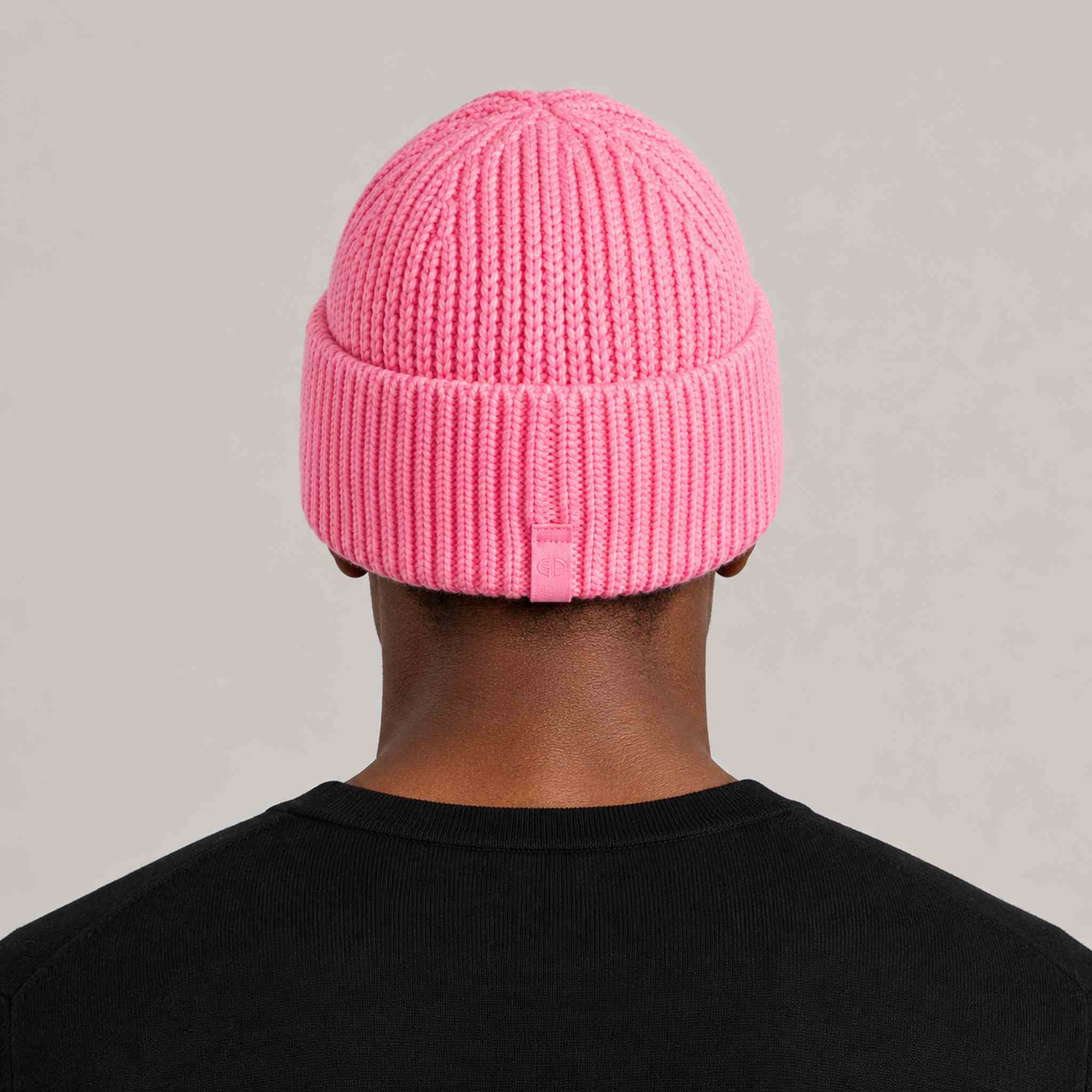 Goldbergh Valerie Beanie in Pink Cosmos in Pink Cosmos — mens back. AI-generated from manufacturer reference photographs.