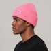 Goldbergh Valerie Beanie in Pink Cosmos in Pink Cosmos — mens side. AI-generated from manufacturer reference photographs.