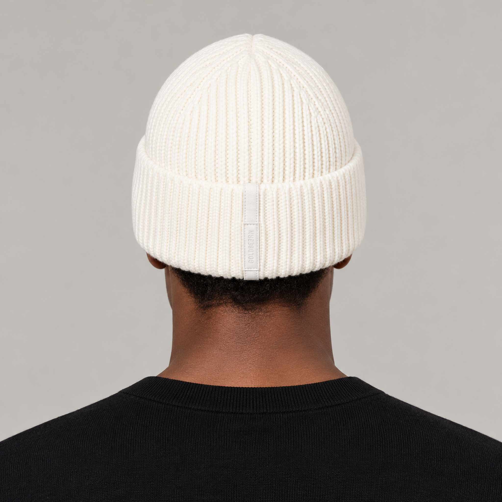 Goldbergh Valerie Beanie in Snow White in Snow White — mens back. AI-generated from manufacturer reference photographs.