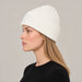 Goldbergh Valerie Beanie in Snow White in Snow White — womens side. AI-generated from manufacturer reference photographs.