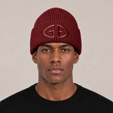 Goldbergh Valerie Beanie in Vino Rosso in Vino Rosso — mens front. AI-generated from manufacturer reference photographs.