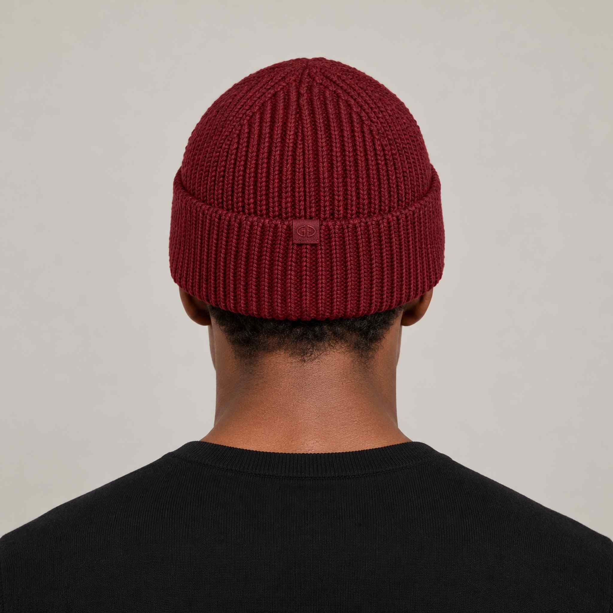 Goldbergh Valerie Beanie in Vino Rosso in Vino Rosso — mens back. AI-generated from manufacturer reference photographs.