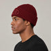 Goldbergh Valerie Beanie in Vino Rosso in Vino Rosso — mens side. AI-generated from manufacturer reference photographs.