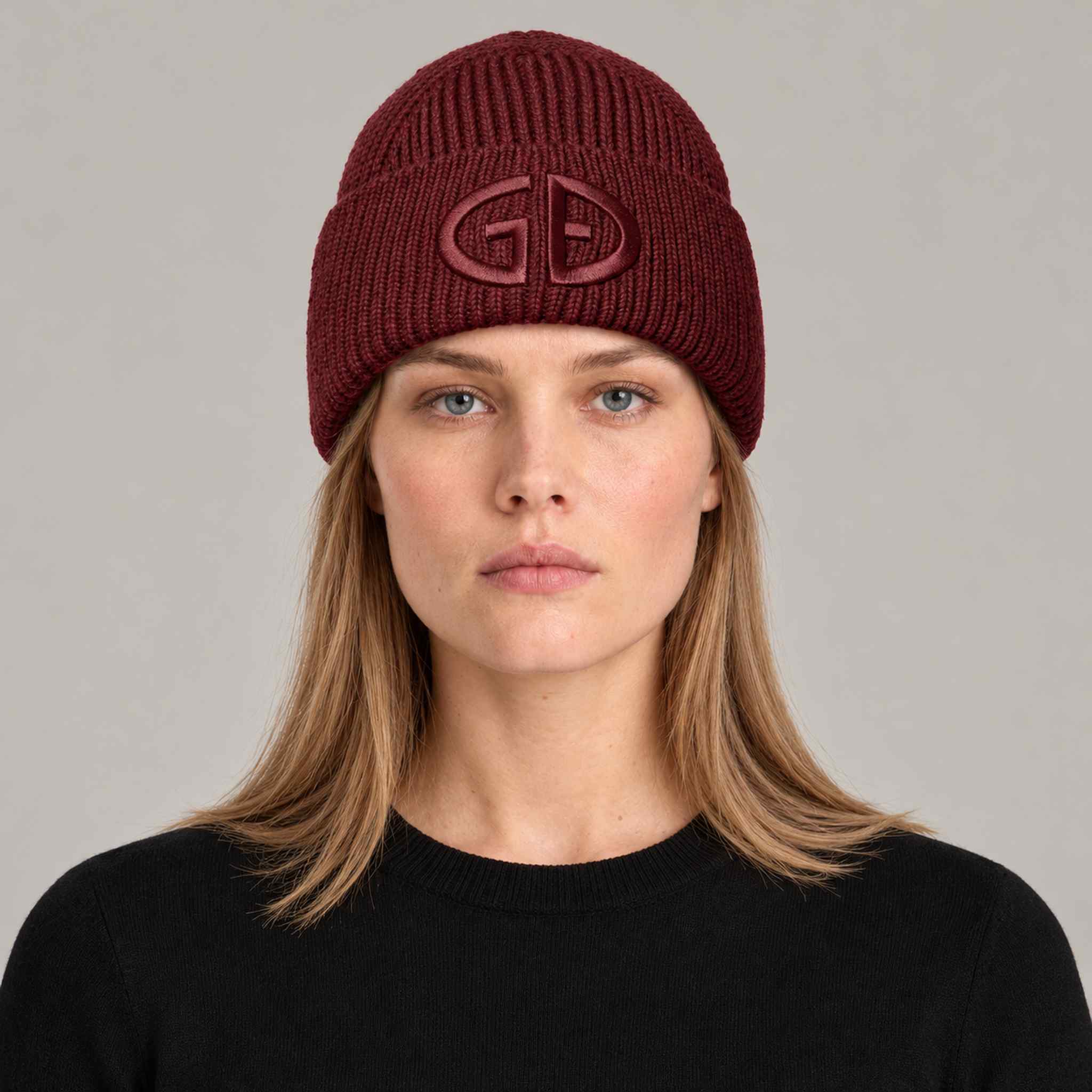 Goldbergh Valerie Beanie in Vino Rosso in Vino Rosso — womens front. AI-generated from manufacturer reference photographs.