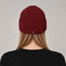Goldbergh Valerie Beanie in Vino Rosso in Vino Rosso — womens back. AI-generated from manufacturer reference photographs.