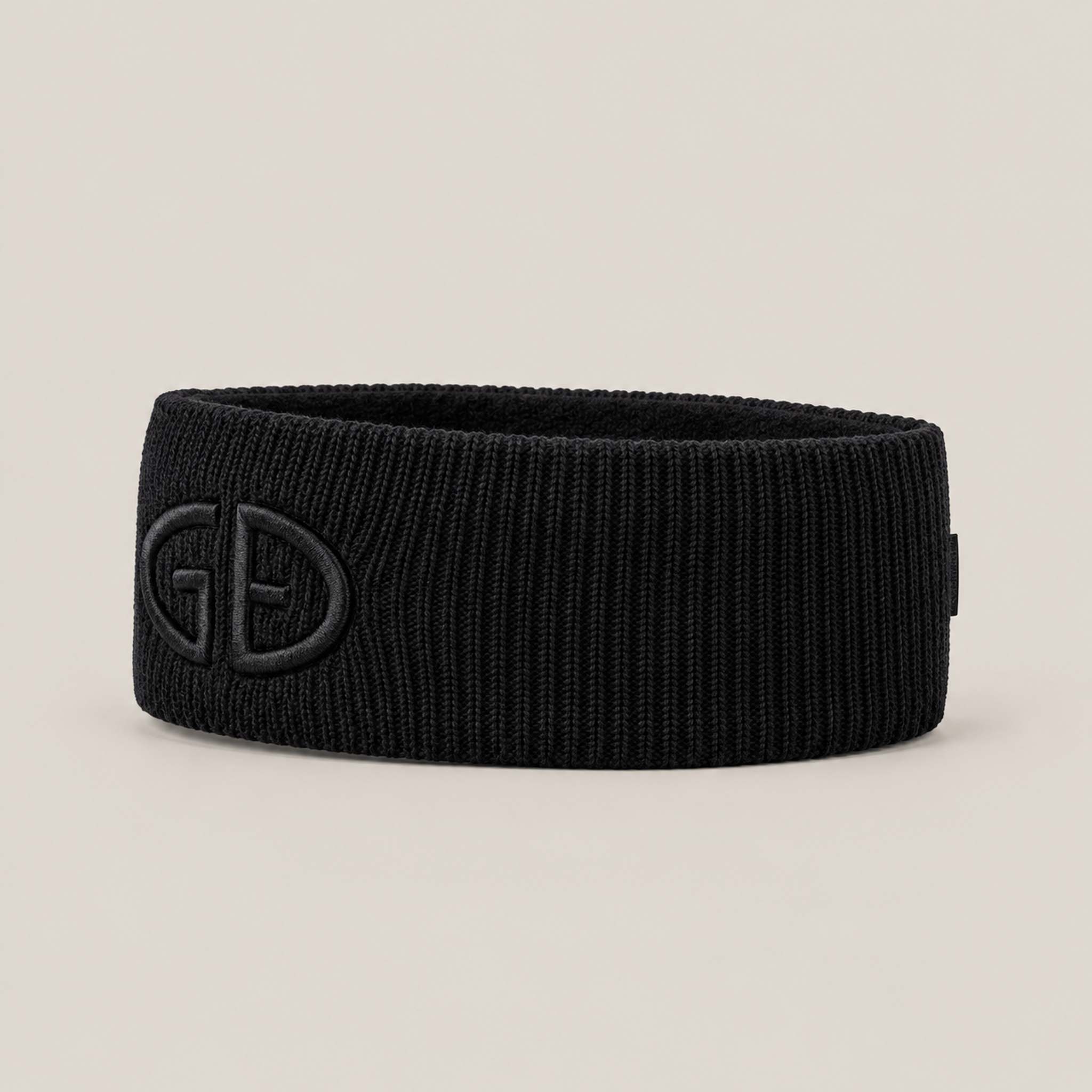 Goldbergh Warmth Headband in Black in Black — side. AI-generated from manufacturer reference photographs.