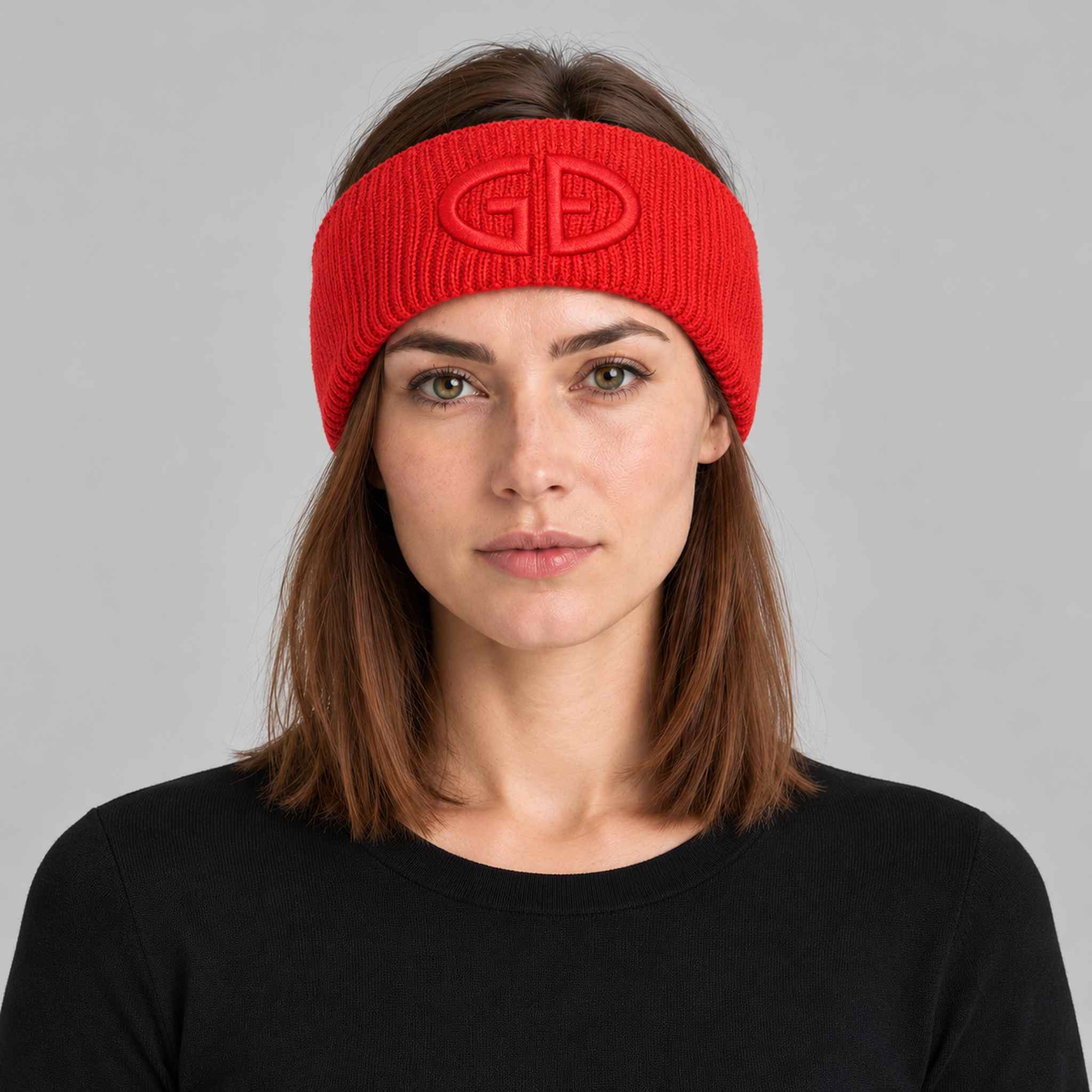 Goldbergh Warmth Headband in Flame Red in Flame — womens front. AI-generated from manufacturer reference photographs.