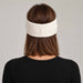 Goldbergh Warmth Headband in Snow White in Snow White — womens back. AI-generated from manufacturer reference photographs.