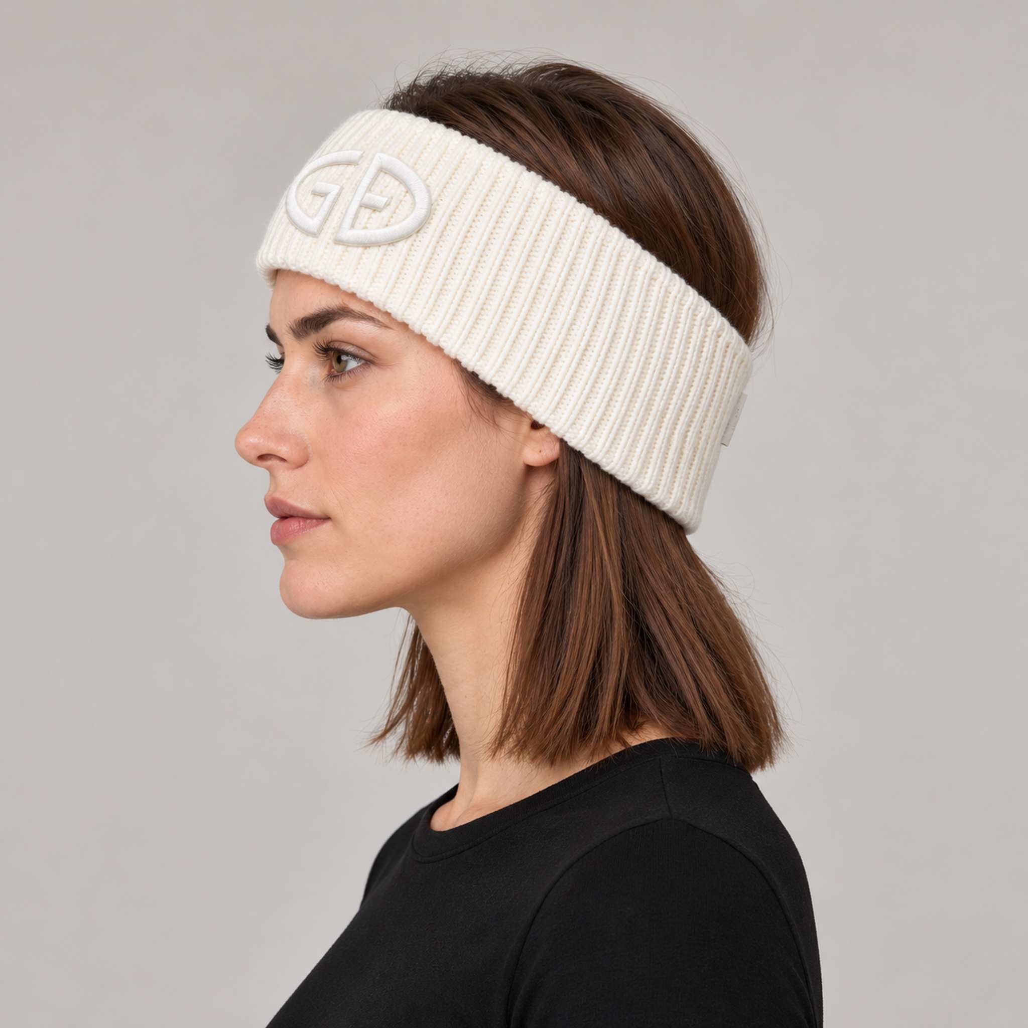 Goldbergh Warmth Headband in Snow White in Snow White — womens side. AI-generated from manufacturer reference photographs.