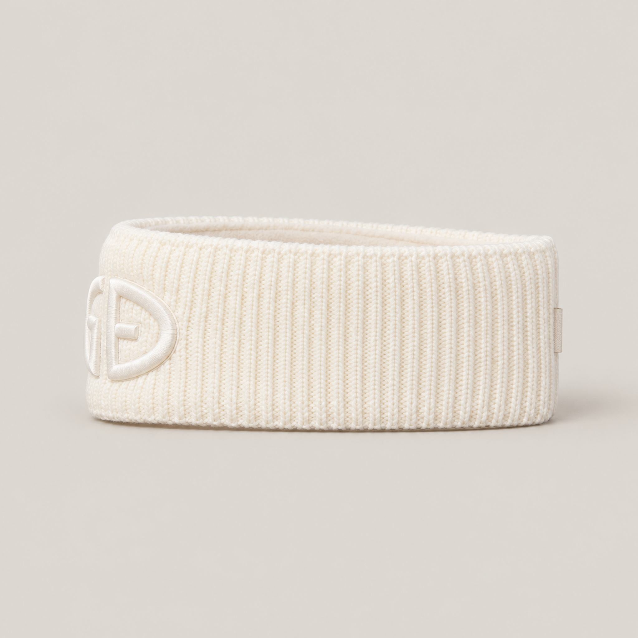 Goldbergh Warmth Headband in Snow White in Snow White — side. AI-generated from manufacturer reference photographs.
