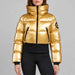 Goldbergh womens Bombardino Ski Jacket in Rich Gold (Rich Gold) - model front. AI-generated from manufacturer imagery.