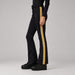 Goldbergh womens Golden Edge Ski Pants in Black (Black) - model side. AI-generated from manufacturer imagery.