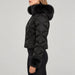 Goldbergh womens Harumi Ski Jacket in Black (Black) - model side. AI-generated from manufacturer imagery.
