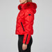 Goldbergh womens Harumi Ski Jacket in Flame Red (Flame) - model side. AI-generated from manufacturer imagery.
