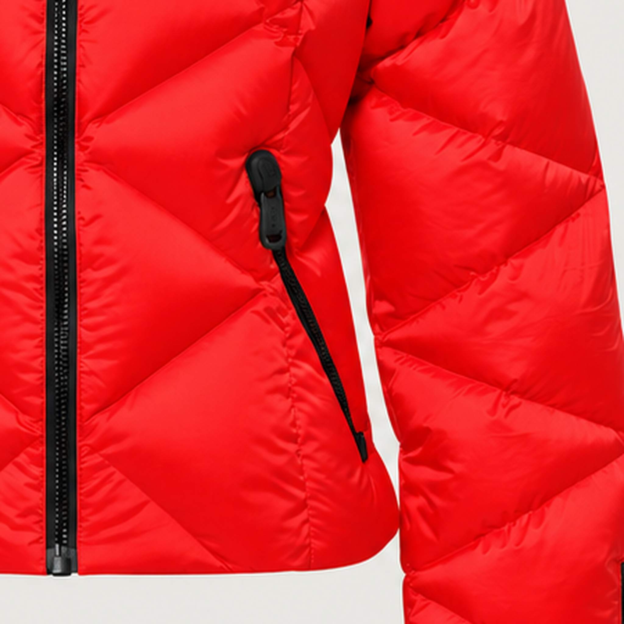 Goldbergh women's Harumi Ski Jacket in Flame Red – hip pocket detail view. AI-generated from manufacturer imagery.