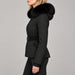 Goldbergh womens Hida Ski Jacket in Black - model side. AI-generated from manufacturer imagery.