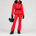 Goldbergh women's Hida Ski Jacket in Flame Red – ski pose view. AI-generated from manufacturer imagery.