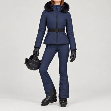 Goldbergh women's Hida Ski Jacket in French Blue – ski pose view. AI-generated from manufacturer imagery.