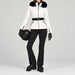 Goldbergh women's Hida Ski Jacket in White – ski pose view. AI-generated from manufacturer imagery.